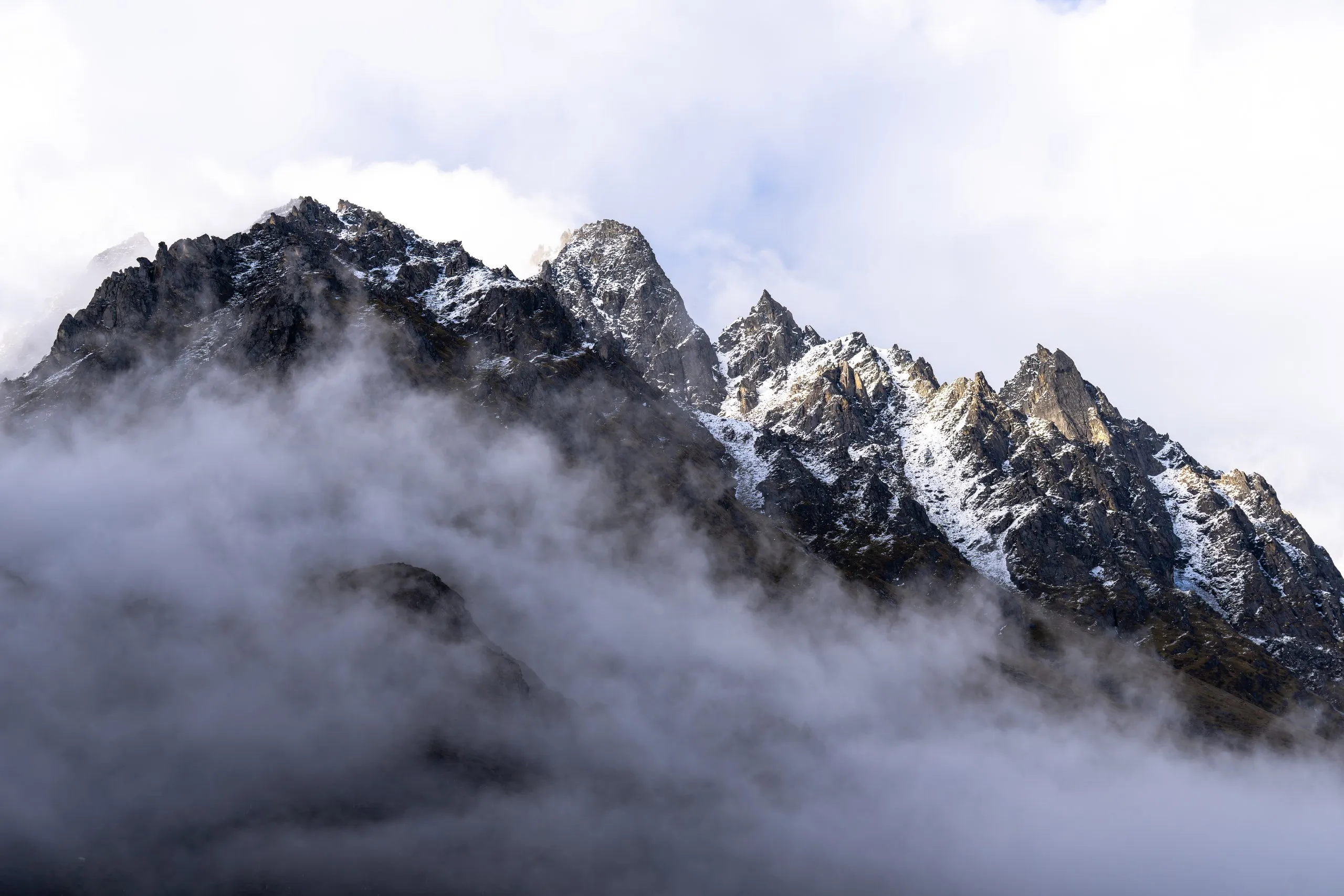 Himalayan peak emerging from clouds, Bhutan